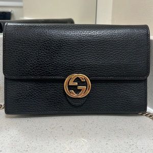 Gucci Purse! Real black cross body. Still in new condition.